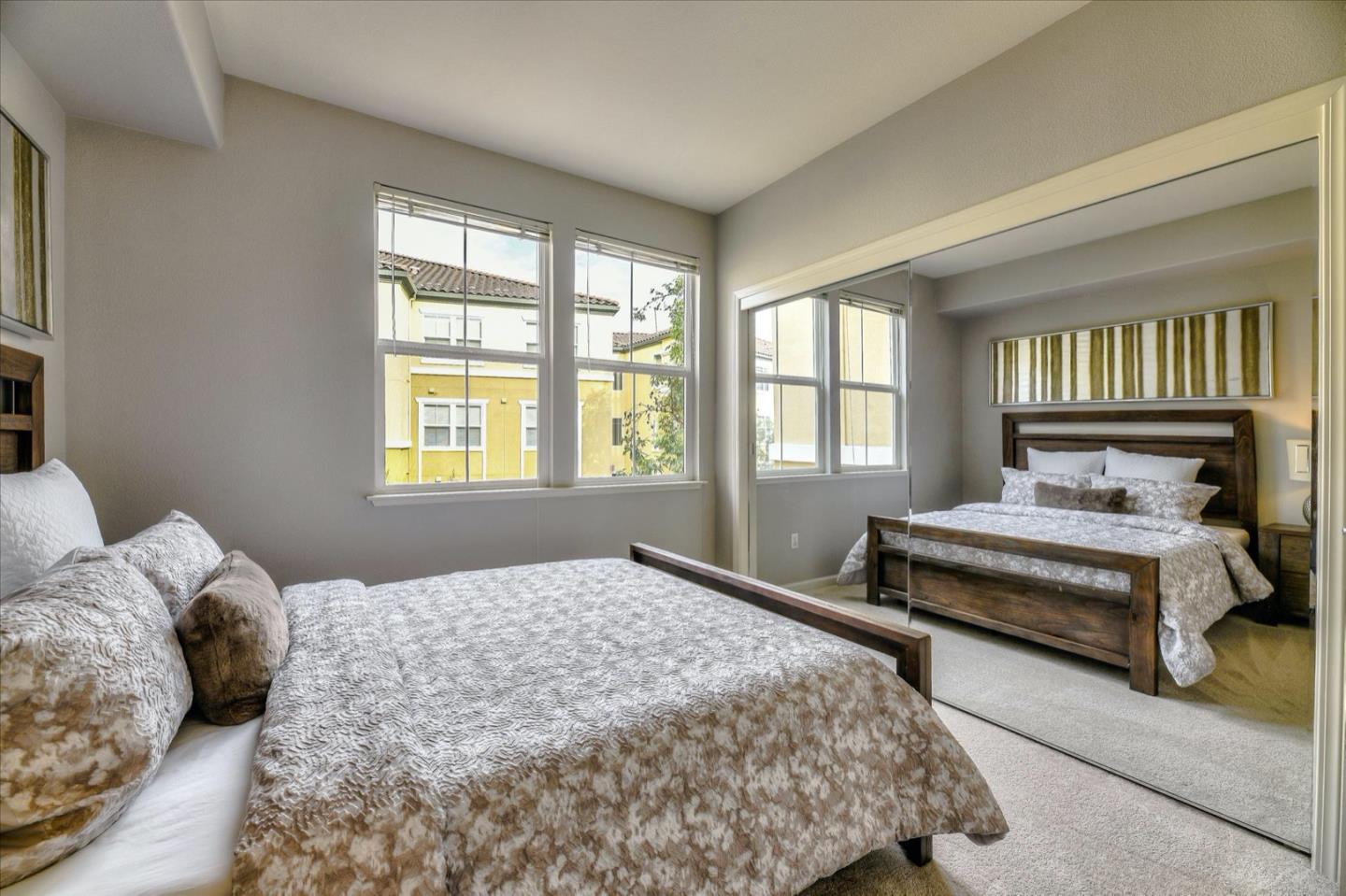 1883 Agnew Road, Unit 357 Santa Clara, CA 95054 - Photo 18 of 27 a bedroom with a bed and a window