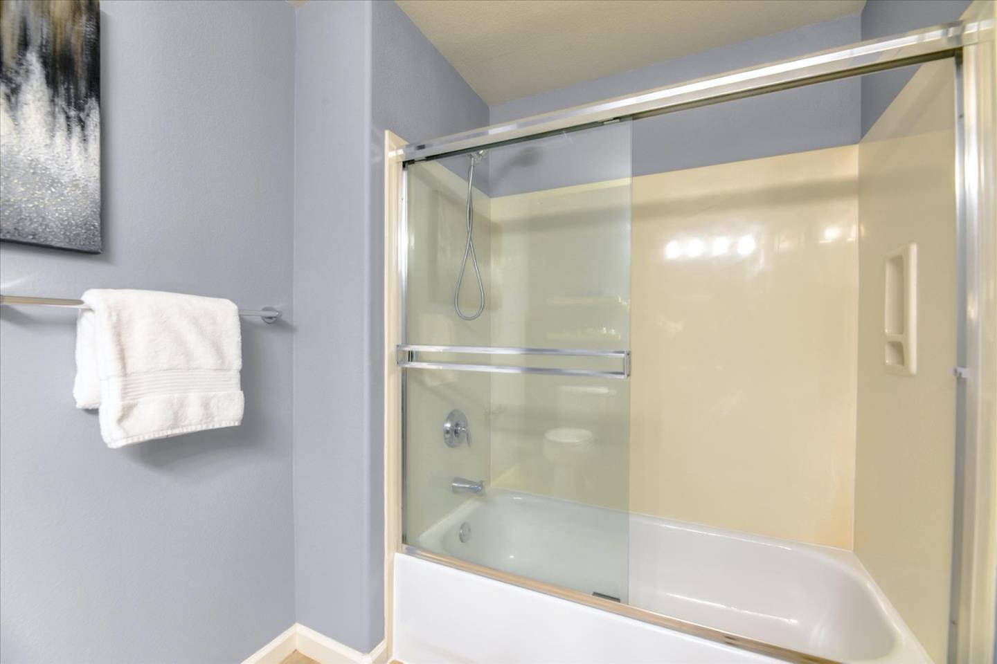 1883 Agnew Road, Unit 357 Santa Clara, CA 95054 - Photo 21 of 27 a bathroom with a glass shower door