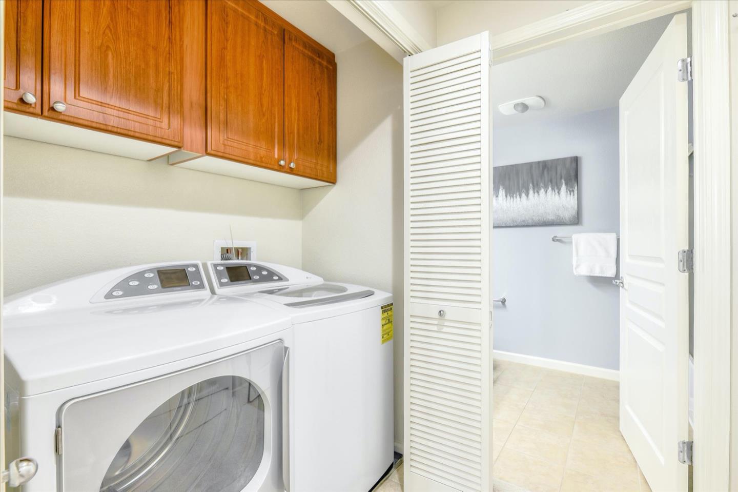 1883 Agnew Road, Unit 357 Santa Clara, CA 95054 - Photo 22 of 27 a utility room with dryer and washer