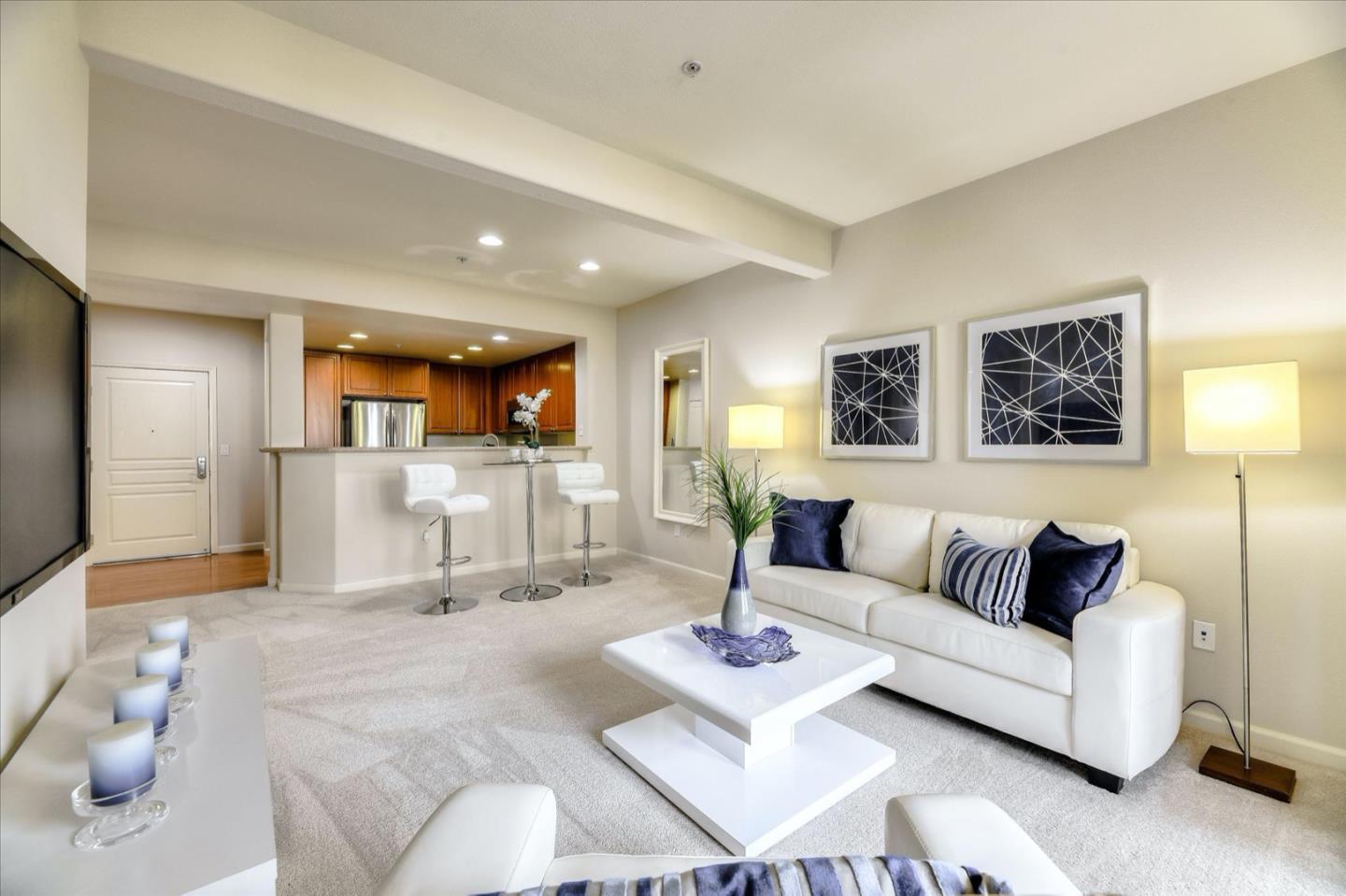 1883 Agnew Road, Unit 357 Santa Clara, CA 95054 - Photo 4 of 27 a living room with furniture and wooden floor