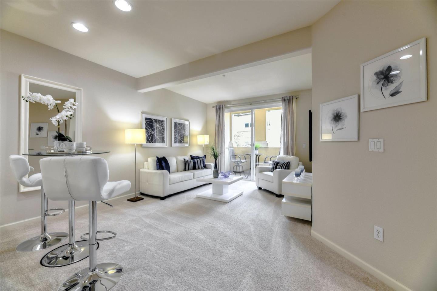 1883 Agnew Road, Unit 357 Santa Clara, CA 95054 - Photo 5 of 27 a living room with furniture and a table