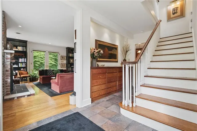 a view of a living room and entry way