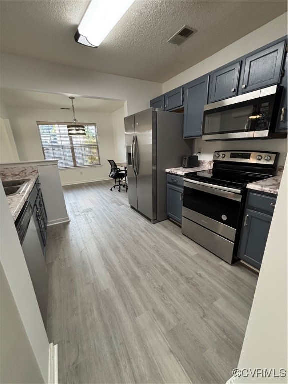 18 Bluesage Path Hampton, VA 23663 - Photo 11 of 28 Kitchen featuring sink, light wood-type flooring,
