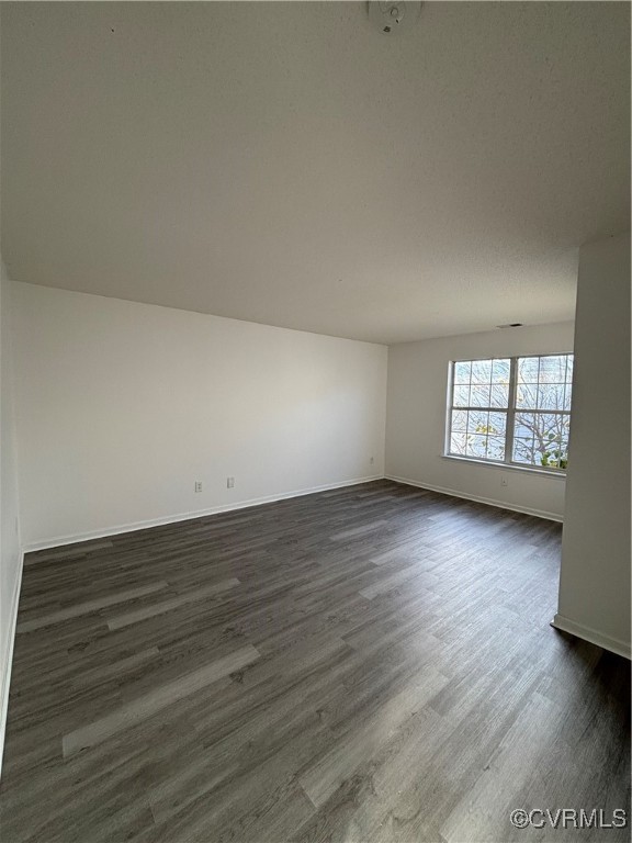 18 Bluesage Path Hampton, VA 23663 - Photo 17 of 28 Spare room with dark hardwood / wood-style floorin