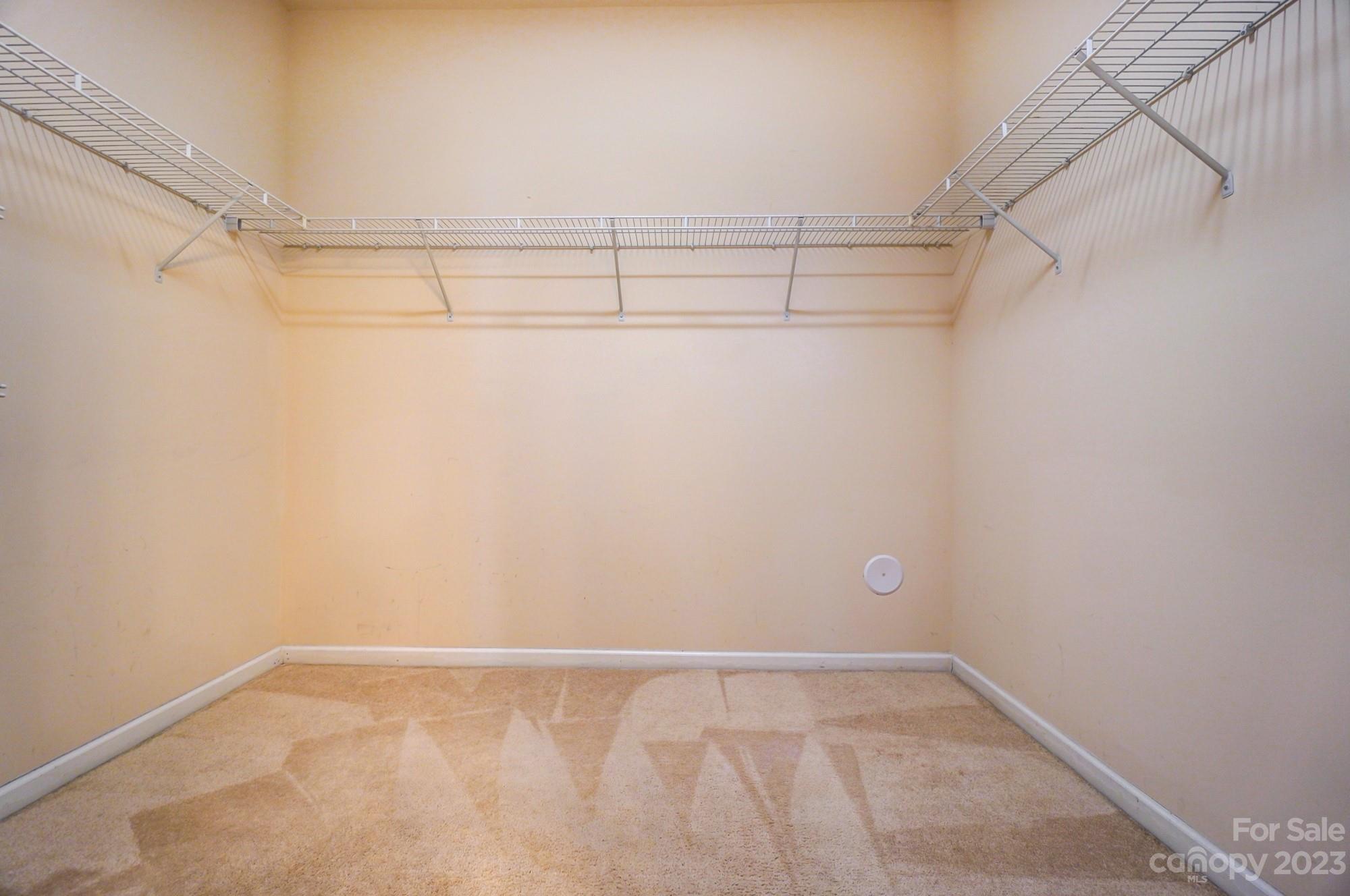 1726 Still River Way Fort Mill, SC 29708 - Photo 12 of 28 a view of a room with racks on the wall