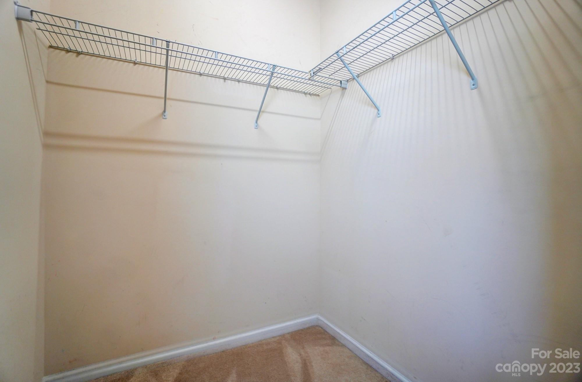 1726 Still River Way Fort Mill, SC 29708 - Photo 14 of 28 a view of a room with racks on the wall