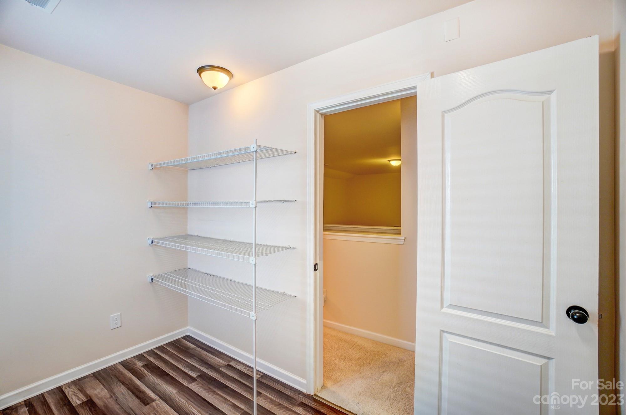 1726 Still River Way Fort Mill, SC 29708 - Photo 21 of 28 a view of a room with rack on the wall