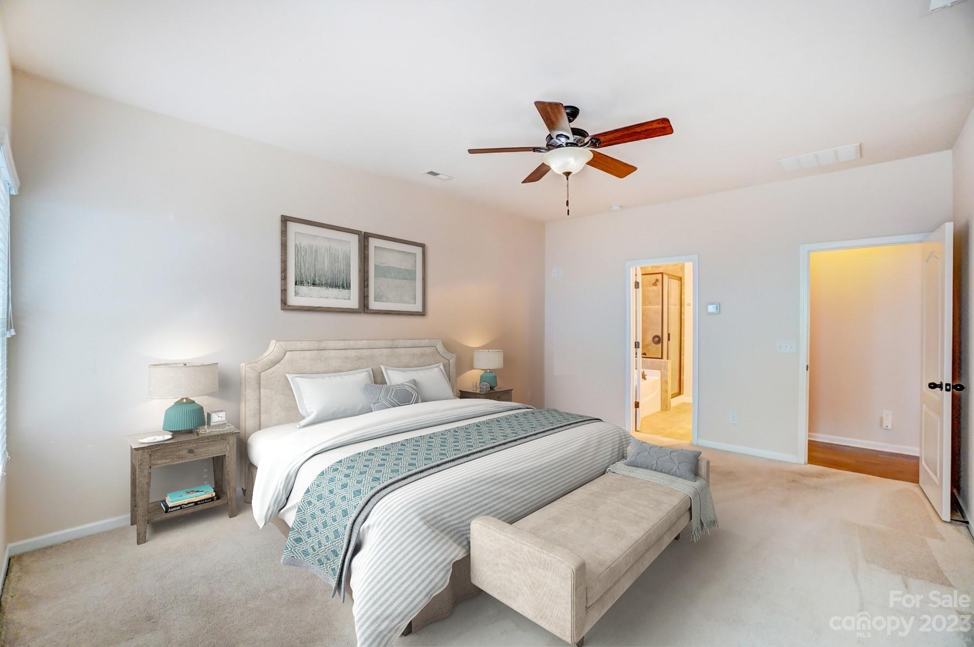 1726 Still River Way Fort Mill, SC 29708 - Photo 9 of 28 a bedroom with a bed and wooden floor