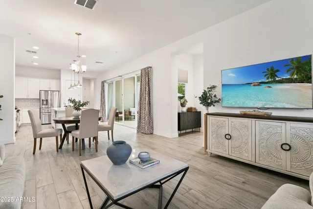 a bedroom with a bed and a lamp