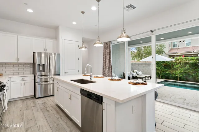 a bedroom with a bed and a couch