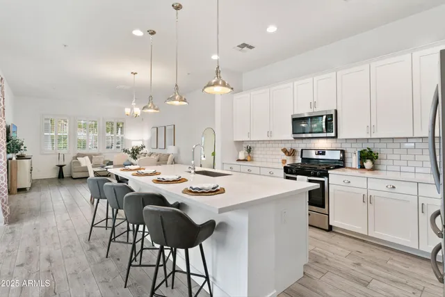 a view of a bedroom with a bed