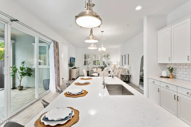 a view of a swimming pool with a lounge chair