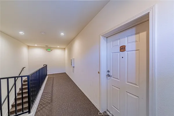 a view of hallway with stairs