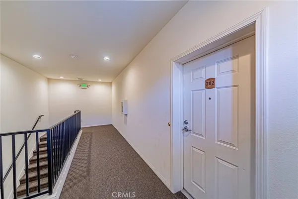 a view of hallway with stairs