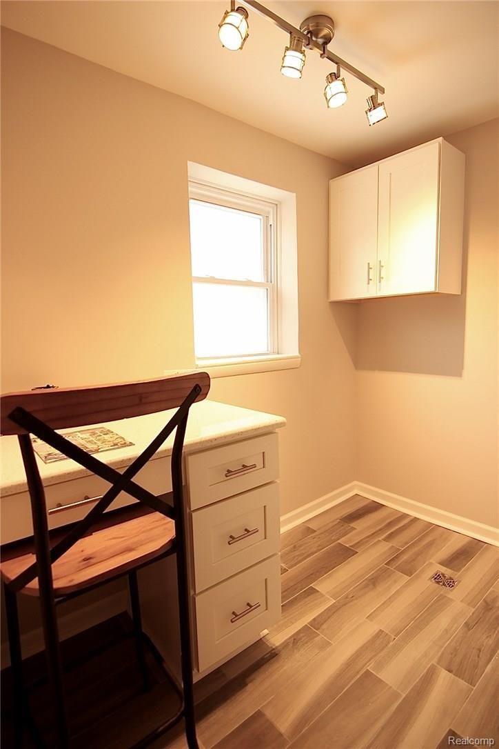 931 West 3rd Street Rochester, MI 48307 - Photo 15 of 62 First floor laundry for either side by side washer and dryer, or full size stackables. Command center for your computer work and mail drop off.