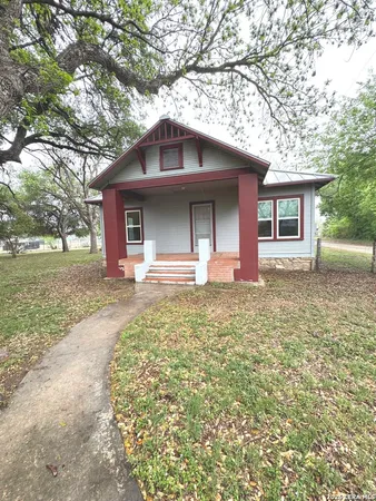 a front view of house with yard