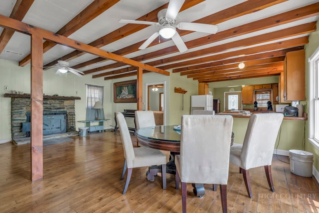 179 Soave Ridge Deep Gap, NC 28618 - Photo 12 of 31 a view of a dining room with furniture and wooden floor