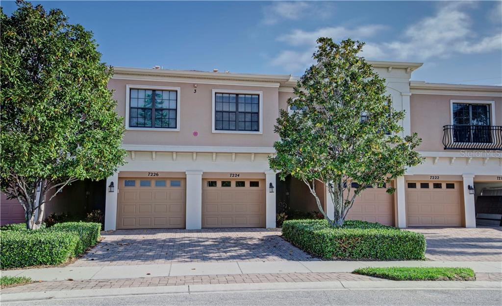 7224 Hamilton Road, Unit 294 Bradenton, FL 34209 - Photo 1 of 1 a front view of a house with a garden