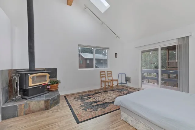 a bathroom with a glass shower door