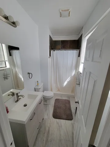 a living room with wooden floor