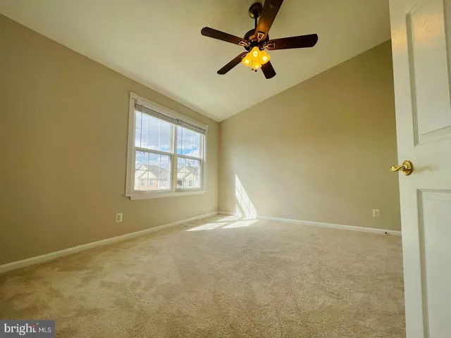 a view of empty room with a window