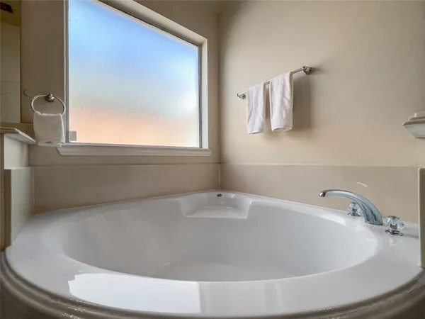 a bathroom with a bathtub