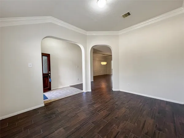 a view of entryway with wooden floor