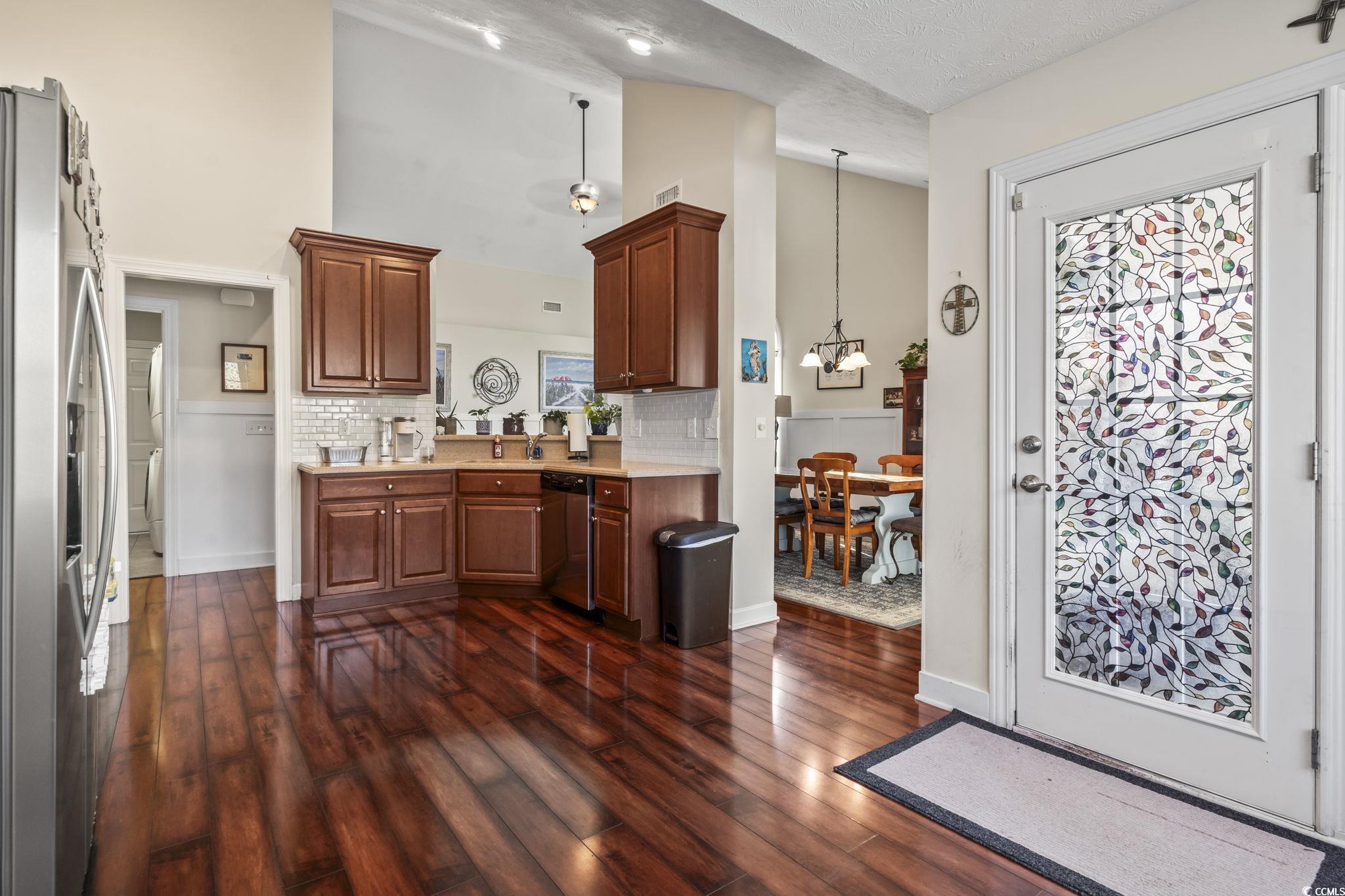 3141 Shorecrest Bay Drive Murrells Inlet, SC 29576 - Photo 11 of 30 Kitchen with backsplash, stainless steel appliance