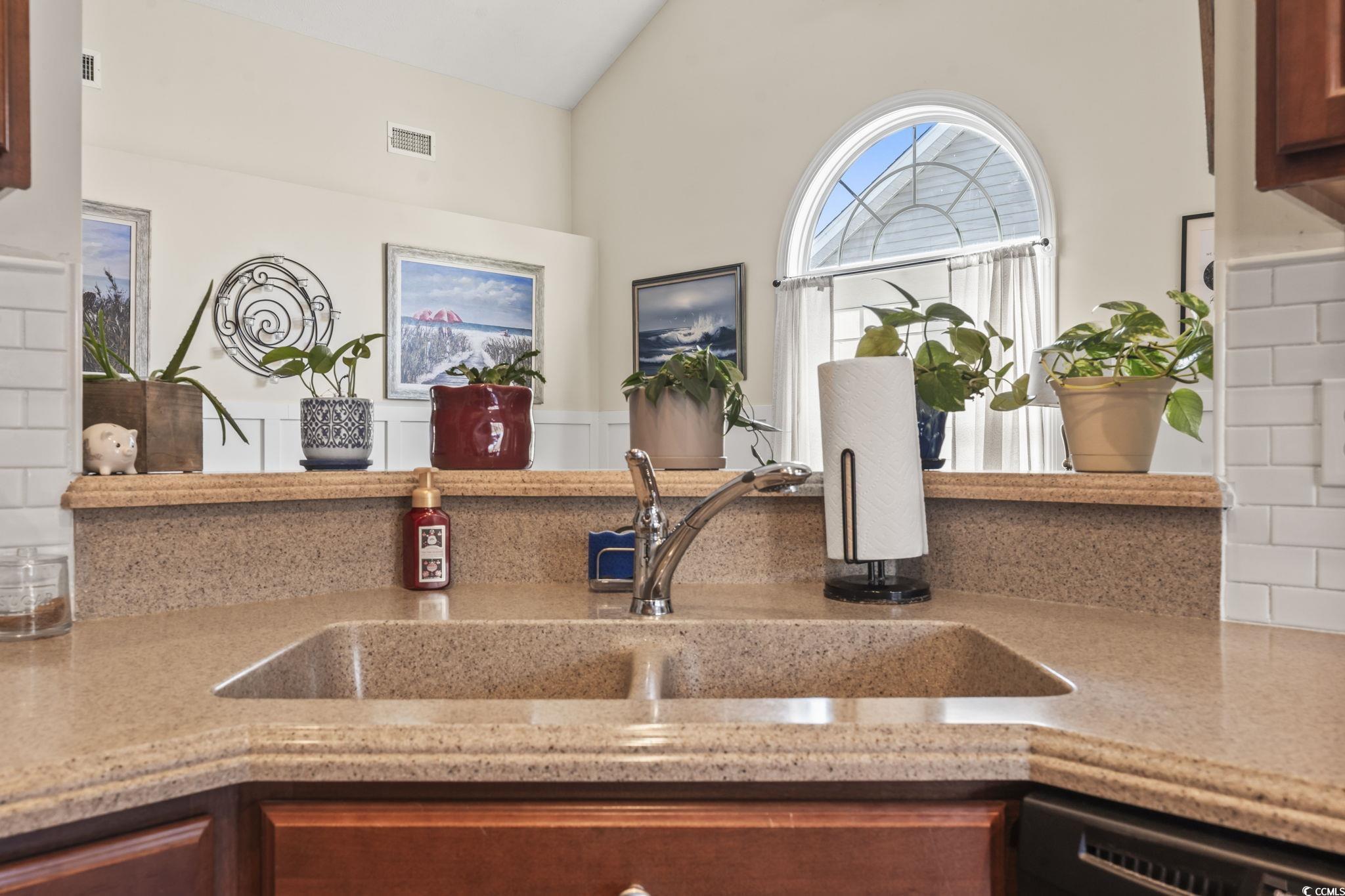 3141 Shorecrest Bay Drive Murrells Inlet, SC 29576 - Photo 13 of 30 Details with tasteful backsplash, black dishwasher