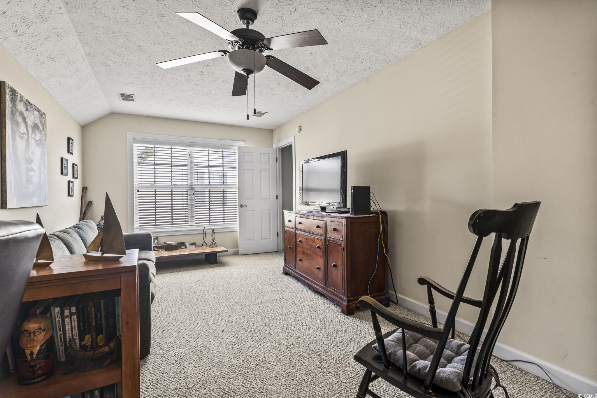 3141 Shorecrest Bay Drive Murrells Inlet, SC 29576 - Photo 17 of 30 Sitting room featuring lofted ceiling, ceiling fan