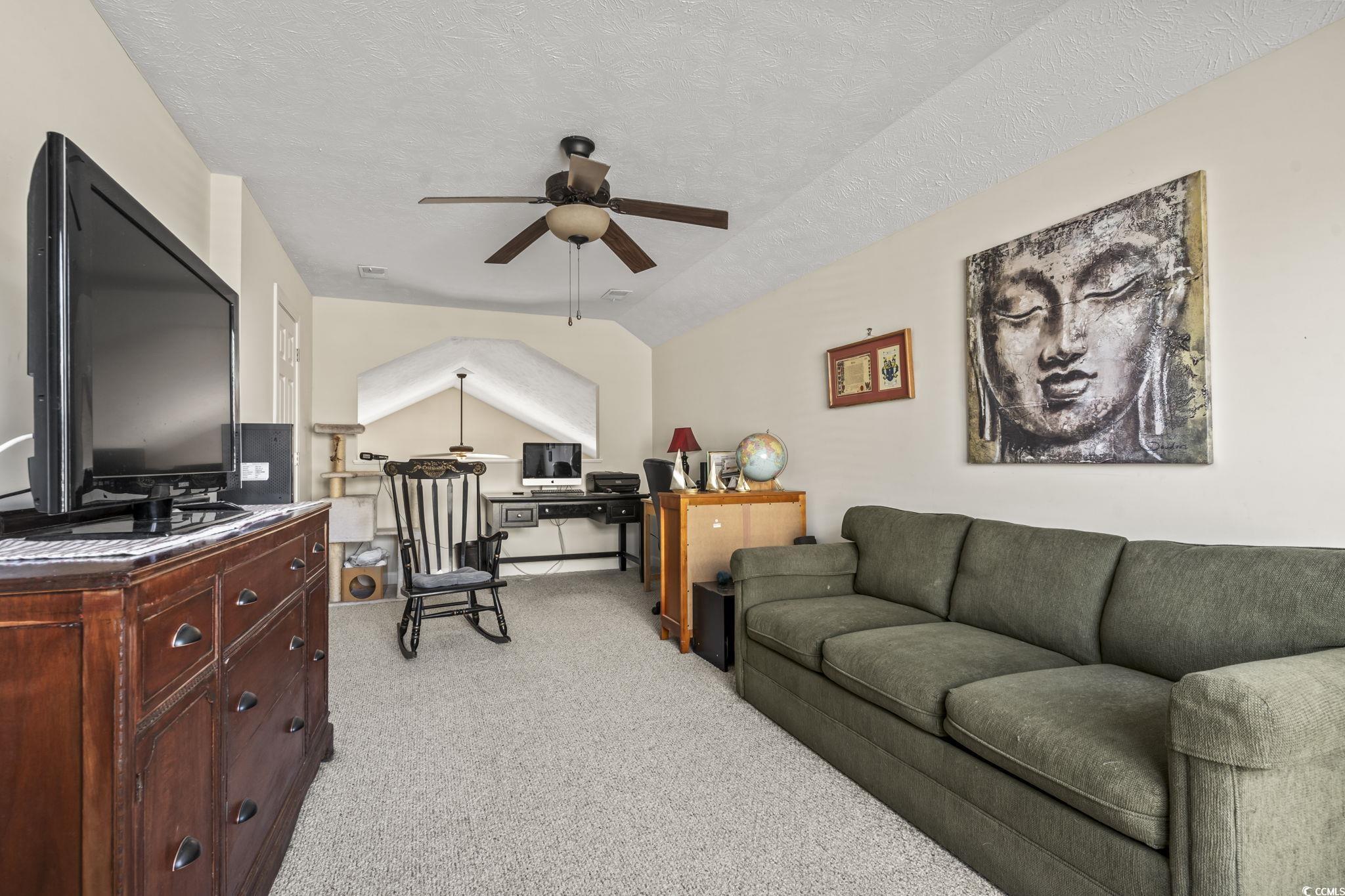 3141 Shorecrest Bay Drive Murrells Inlet, SC 29576 - Photo 18 of 30 Living room with lofted ceiling, ceiling fan, ligh