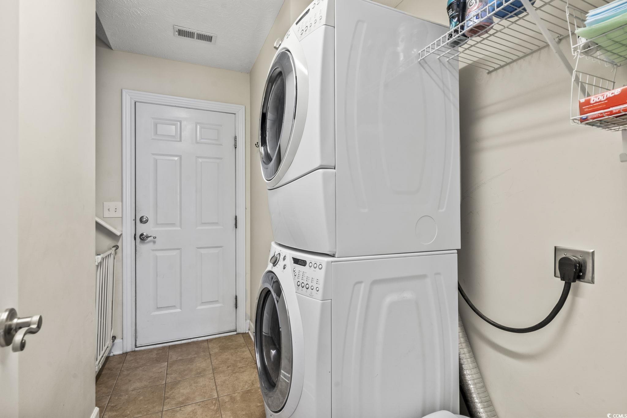3141 Shorecrest Bay Drive Murrells Inlet, SC 29576 - Photo 23 of 30 Clothes washing area featuring tile patterned floo