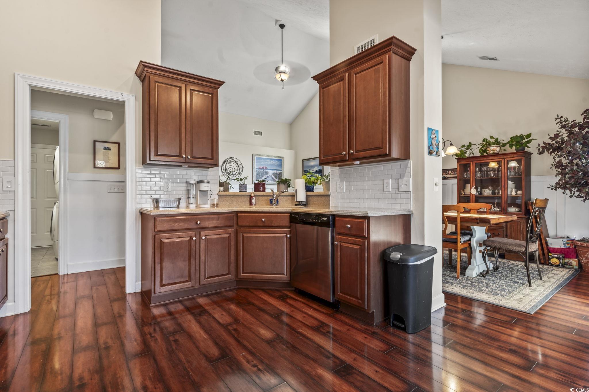 3141 Shorecrest Bay Drive Murrells Inlet, SC 29576 - Photo 6 of 30 Kitchen featuring sink, tasteful backsplash, high
