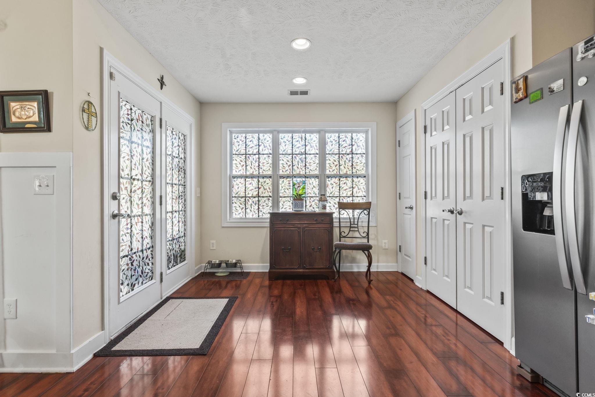 3141 Shorecrest Bay Drive Murrells Inlet, SC 29576 - Photo 7 of 30 Interior space with dark hardwood / wood-style flo