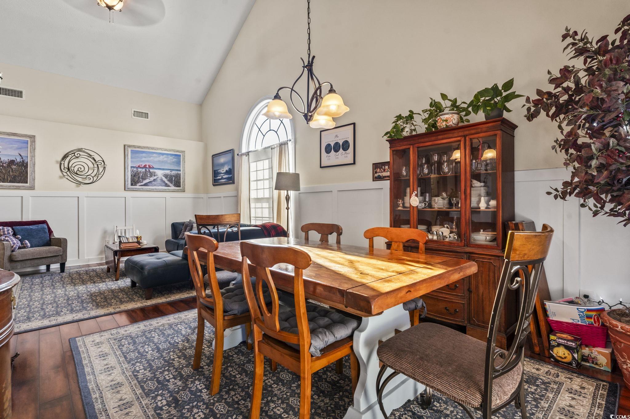 3141 Shorecrest Bay Drive Murrells Inlet, SC 29576 - Photo 10 of 30 Dining area featuring hardwood / wood-style floori