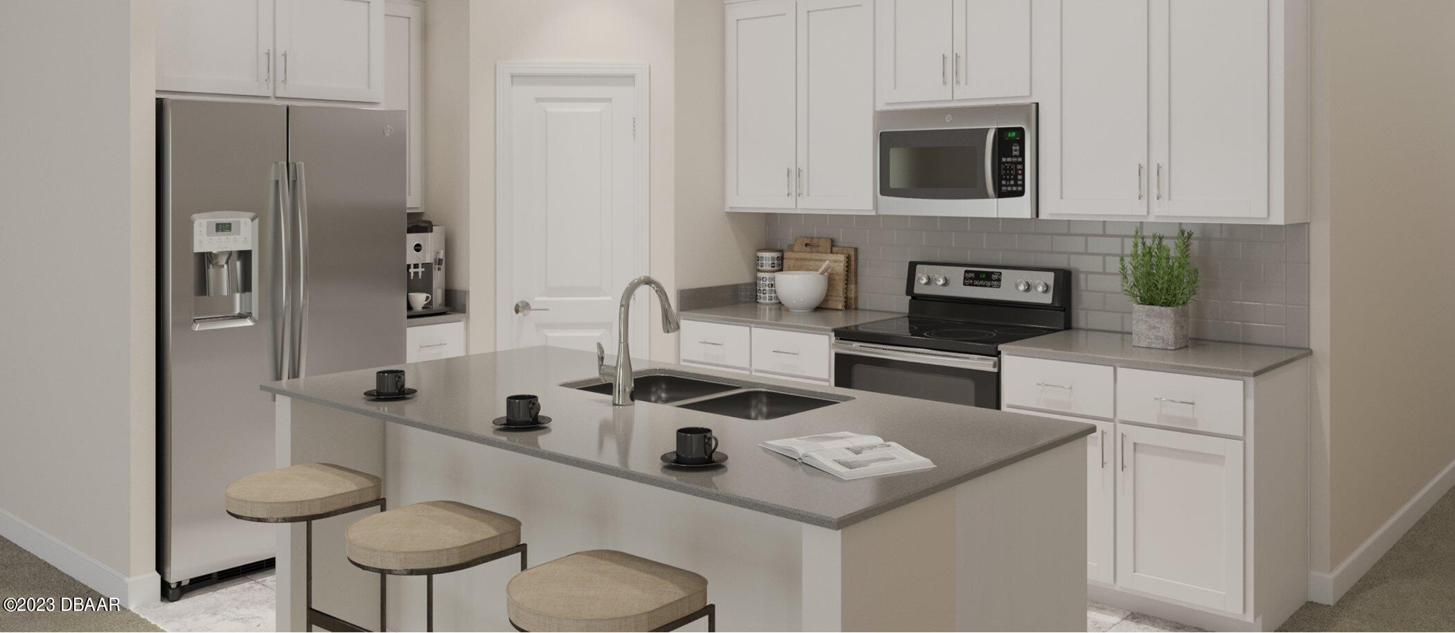 3981 Willowbrook Drive Edgewater, FL 32141 - Photo 2 of 12 a kitchen with stainless steel appliances granite countertop a sink and a white cabinets