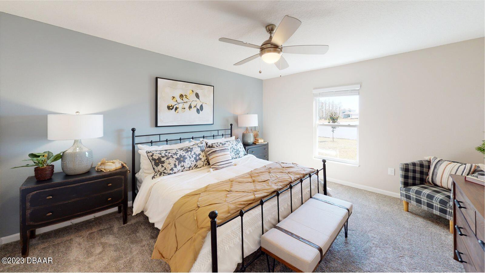 3981 Willowbrook Drive Edgewater, FL 32141 - Photo 9 of 12 a bedroom with a bed and furniture