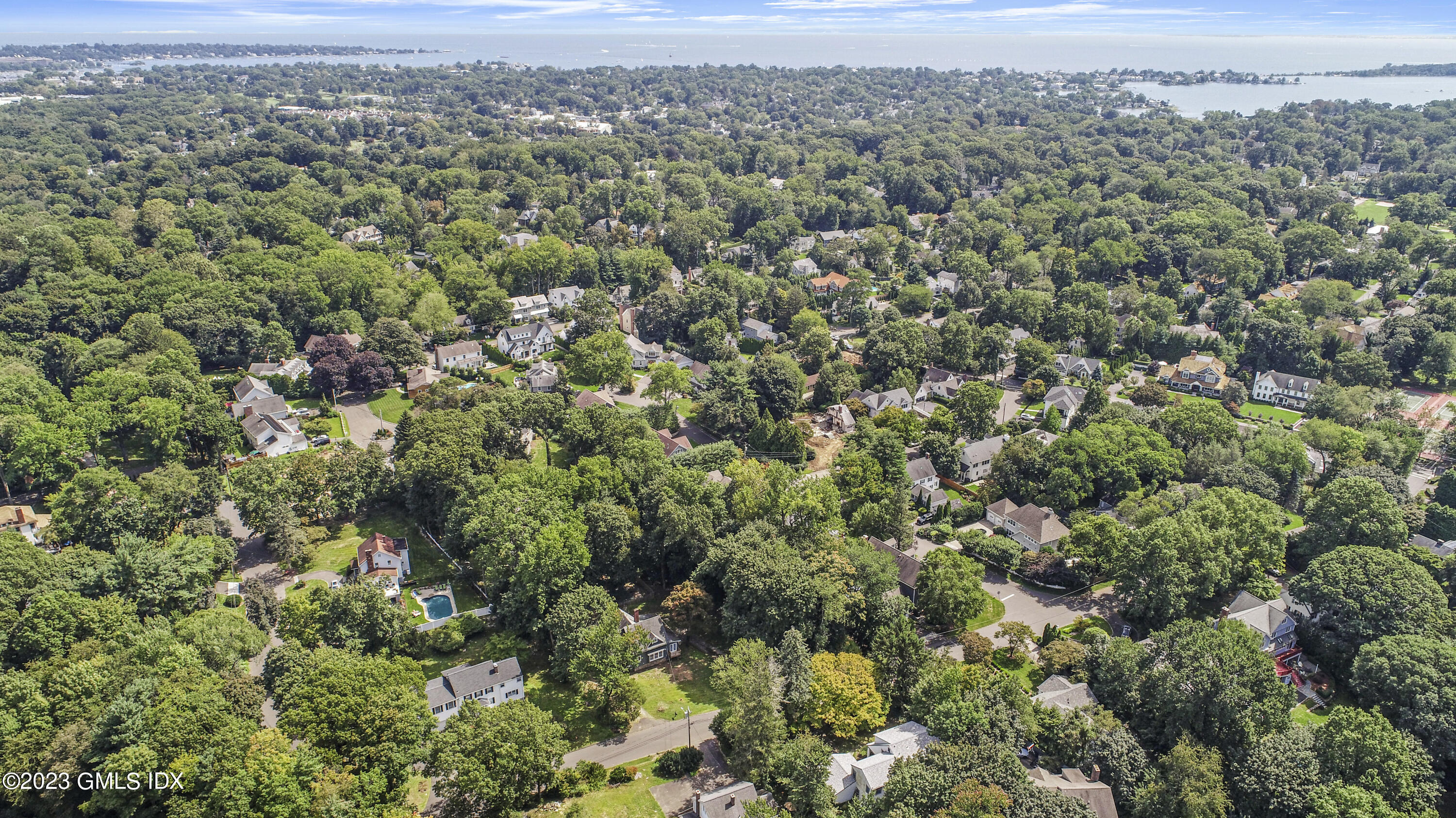 33 Breezemont Avenue Riverside, CT 06878 - Photo 20 of 31 an aerial view of a houses with a yard