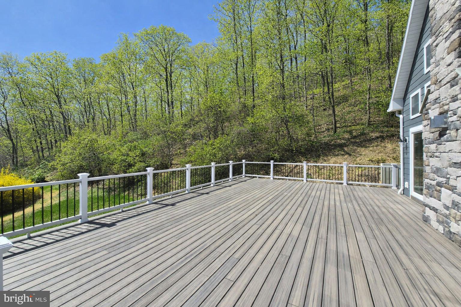 759 River Road Erwinna, PA 18920 - Photo 8 of 46 a view of a balcony with wooden floor and fence