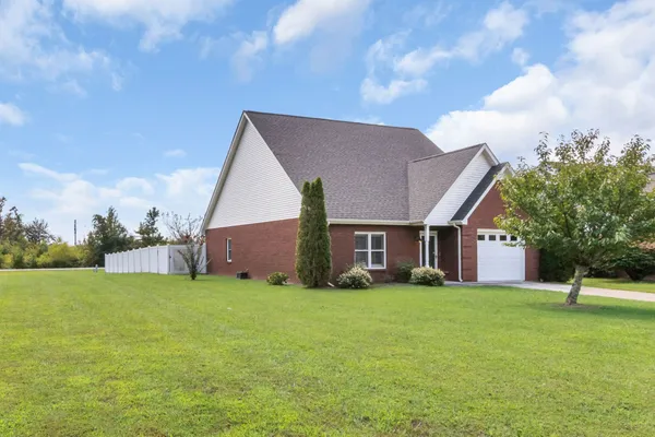 a house with garden in front of it