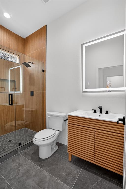 2007 North Montclair Avenue Dallas, TX 75208 - Photo 20 of 31 a bathroom with a sink toilet and shower