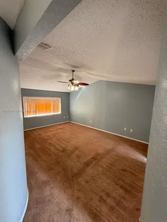 en empty room with windows