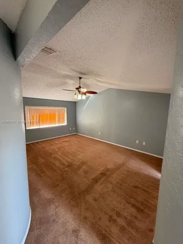 en empty room with windows