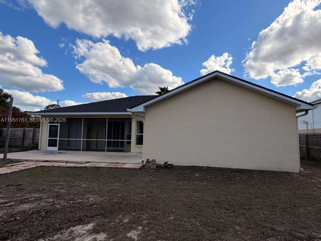 6229 Gainsboro Avenue Spring Hill, FL 34609 - Photo 7 of 25 a view of a house with a yard