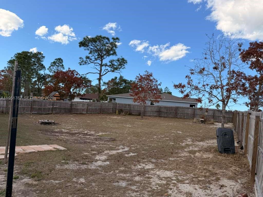 6229 Gainsboro Avenue Spring Hill, FL 34609 - Photo 8 of 25 a view of a yard