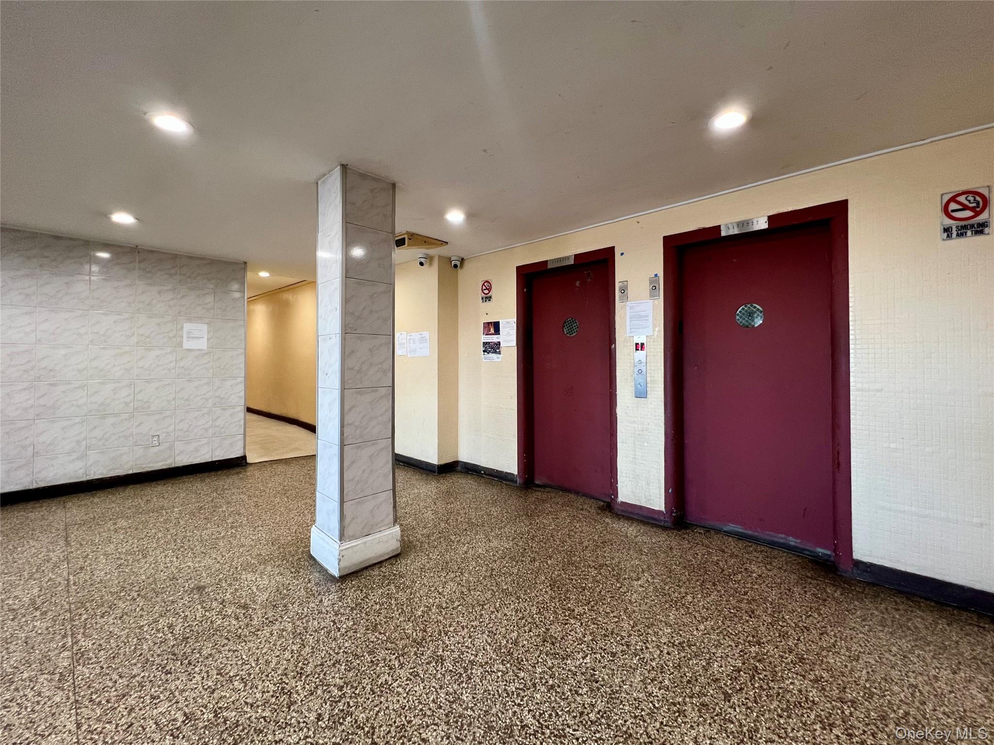 86-16 60th Avenue, Unit 2D Queens, NY 11373 - Photo 24 of 30 a view of a livingroom with a hall