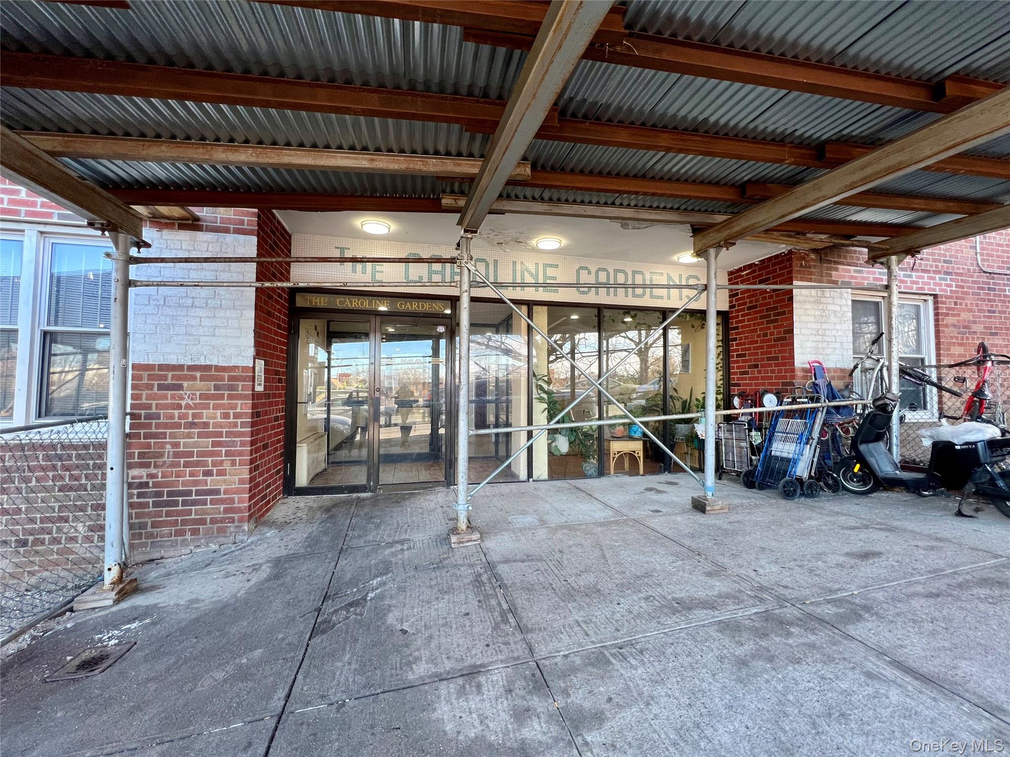 86-16 60th Avenue, Unit 2D Queens, NY 11373 - Photo 27 of 30 a view of outdoor space with porch