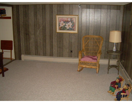 20 Mission Road Tyngsborough, MA 01879 - Photo 19 of 27 a living room with furniture and a window