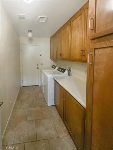 a view of a kitchen with a sink