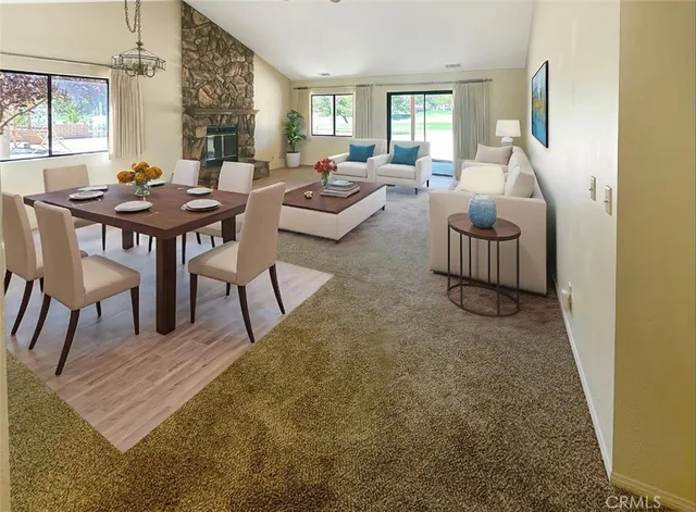 a view of a livingroom with furniture and window